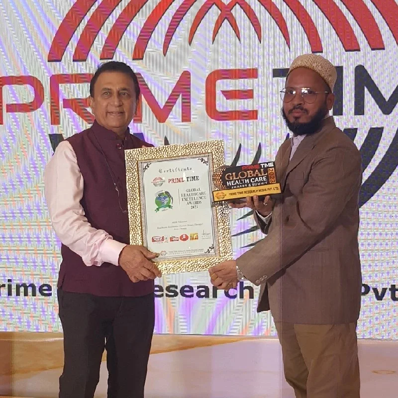 dr saifuddin with sunil gavaskar